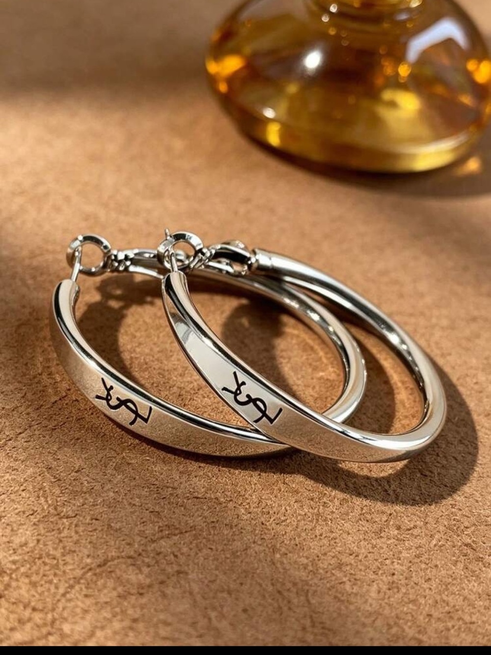 Yves Saint Laurent Silver Hoop Earrings with Signature Engraving